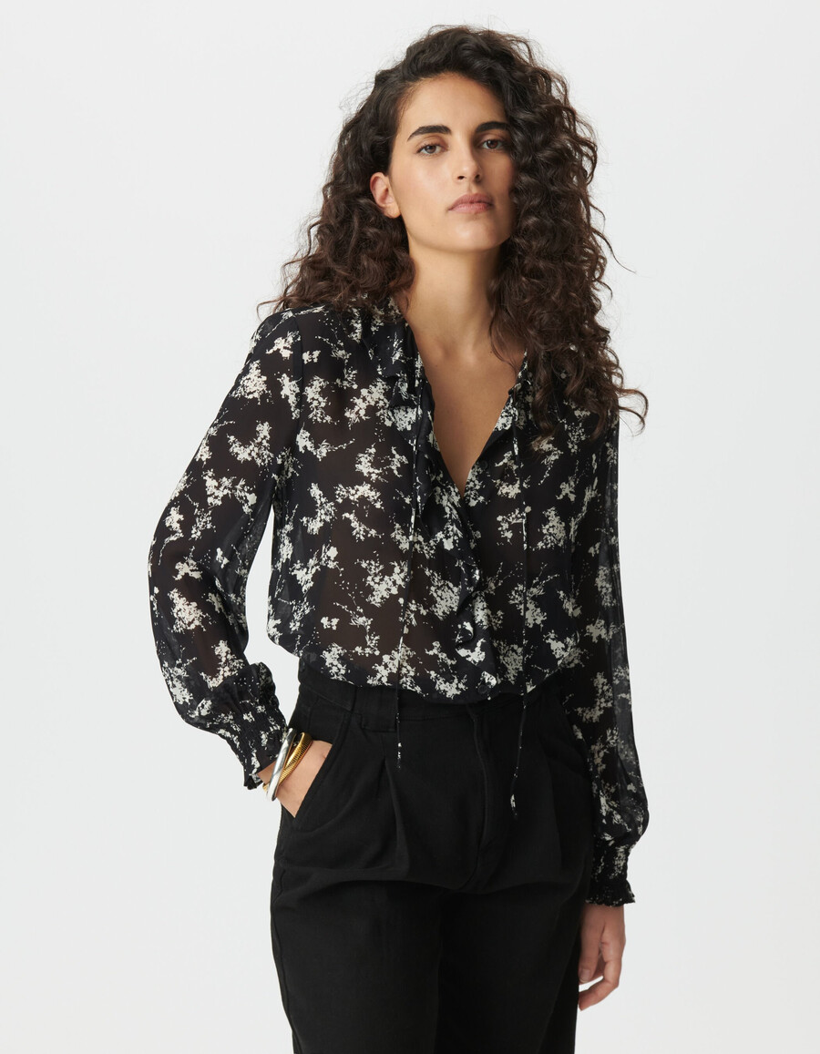 damesblouse van zwarte voile met bloemenprint