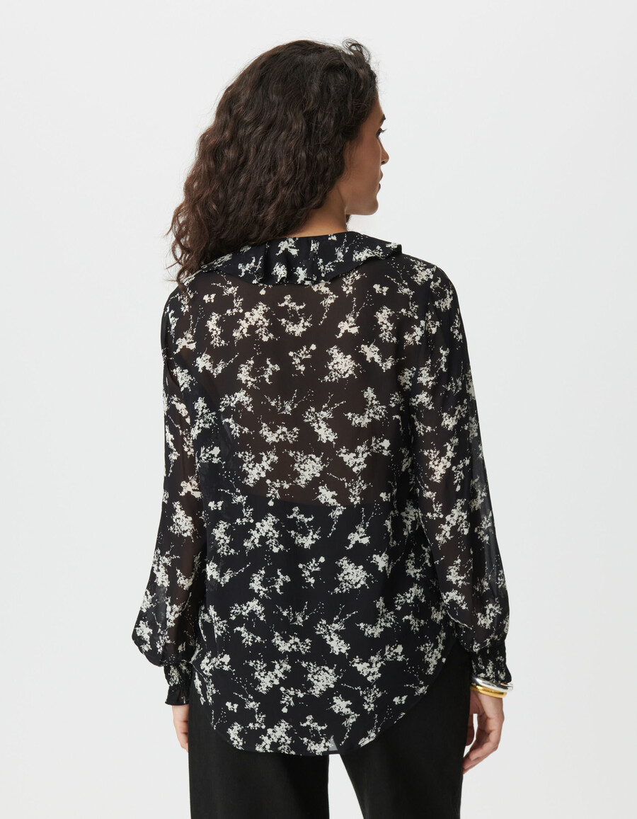 damesblouse van zwarte voile met bloemenprint