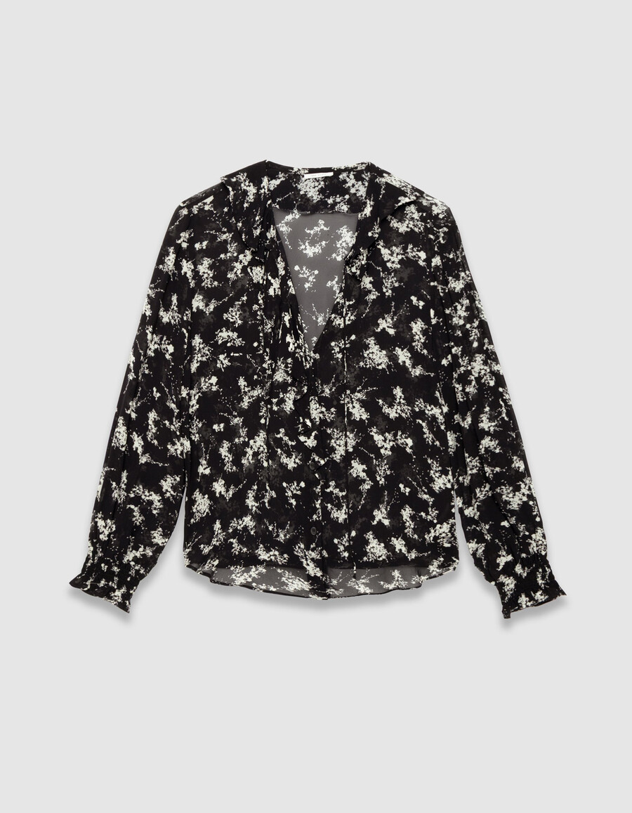 damesblouse van zwarte voile met bloemenprint