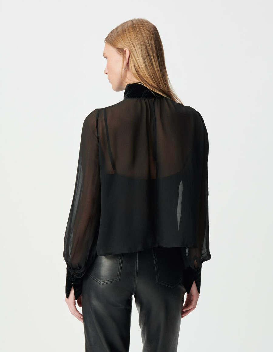 damesblouse van zwarte voile met details van gekreukeld fluweel